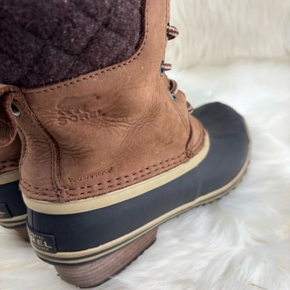 Sorel Tan and Black Lace-Up Boots